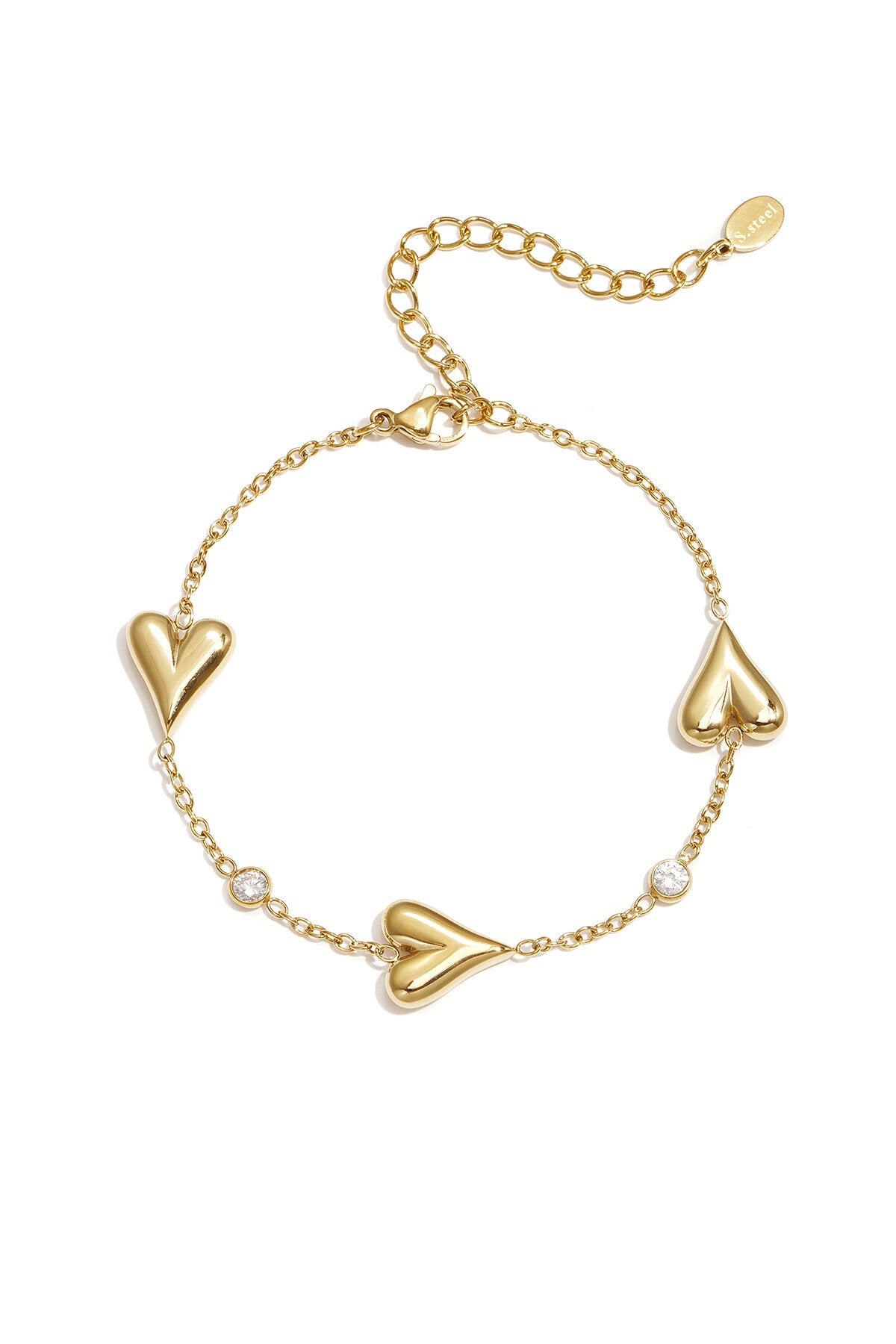 Armband Mit Drei Massiven Herzen Und Steinen – Goldfarbe – Bild 1