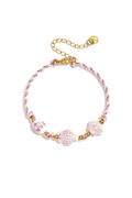 Armband Mit Schildpatt- Und Muschelperlen Und Seilmotiv – Rosa – Bild 1