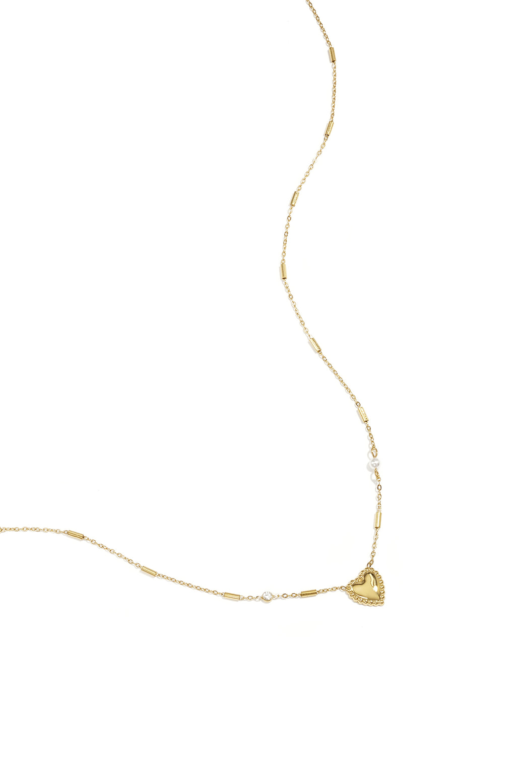Halskette mit Perle, Stein und auffälligem Herz